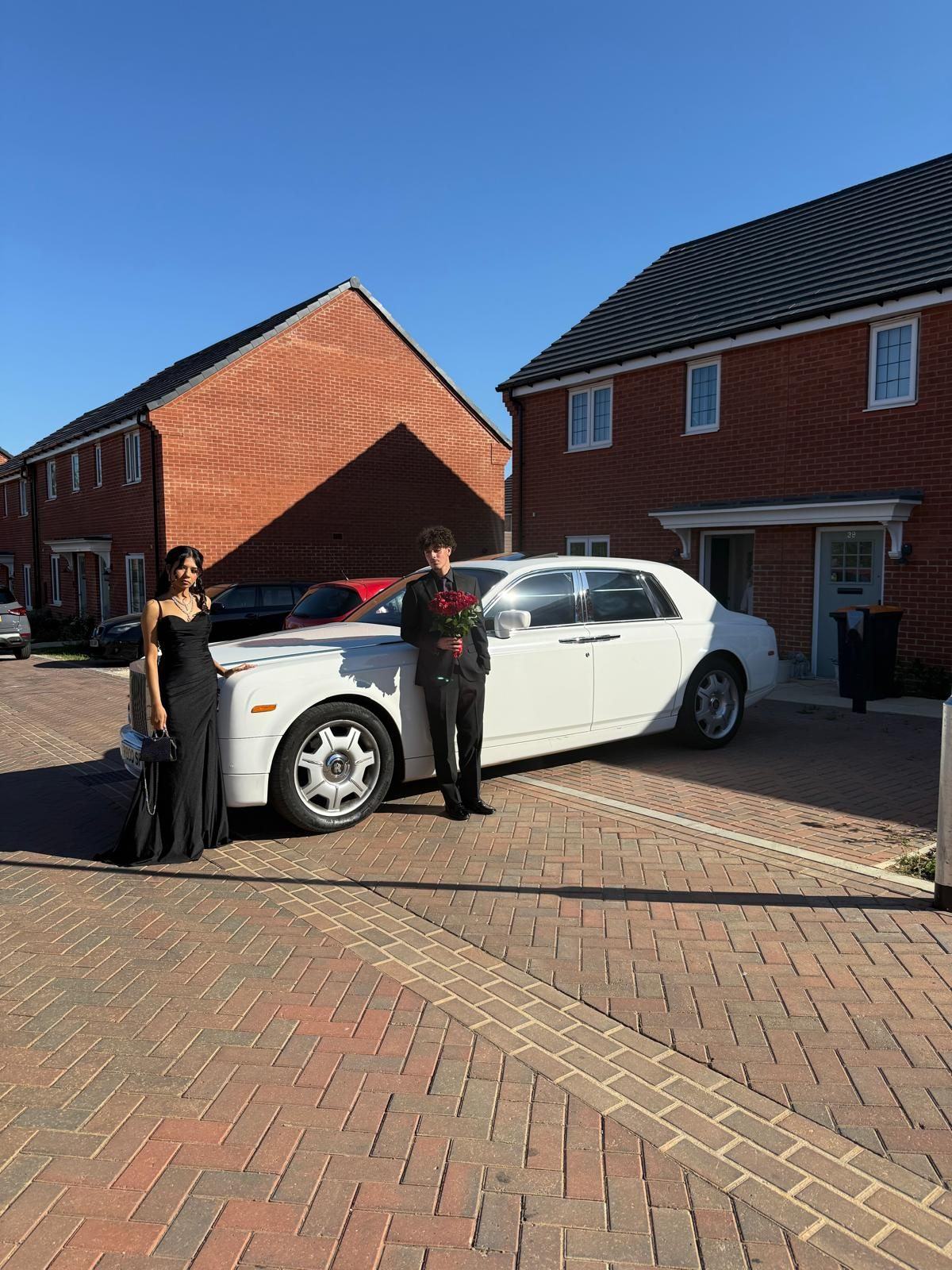 Prom couple with white Rolls-Royce Phantom — Bedford Executive Cars
