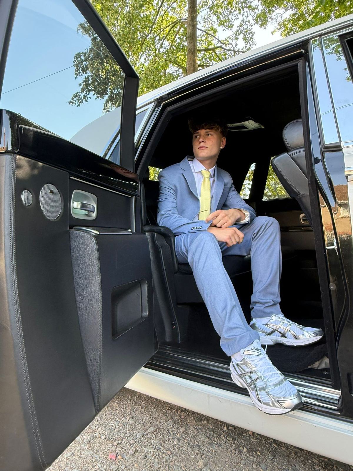Prom guest stepping out of Rolls-Royce Phantom — Bedford Executive Cars